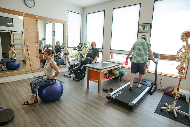 Patients exercising in exercise room